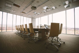 Image of a large conference table and chairs