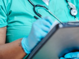 Image of hospital staff making patient notes